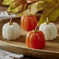 Bougie forme citrouille 4 pièces Ø4,5xH4cm (4 modèles)