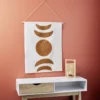 Décoration murale toile motif lune coton beige et terracotta