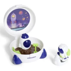 Mini astronaute avec fusée bleu et blanc Ø8xH8cm