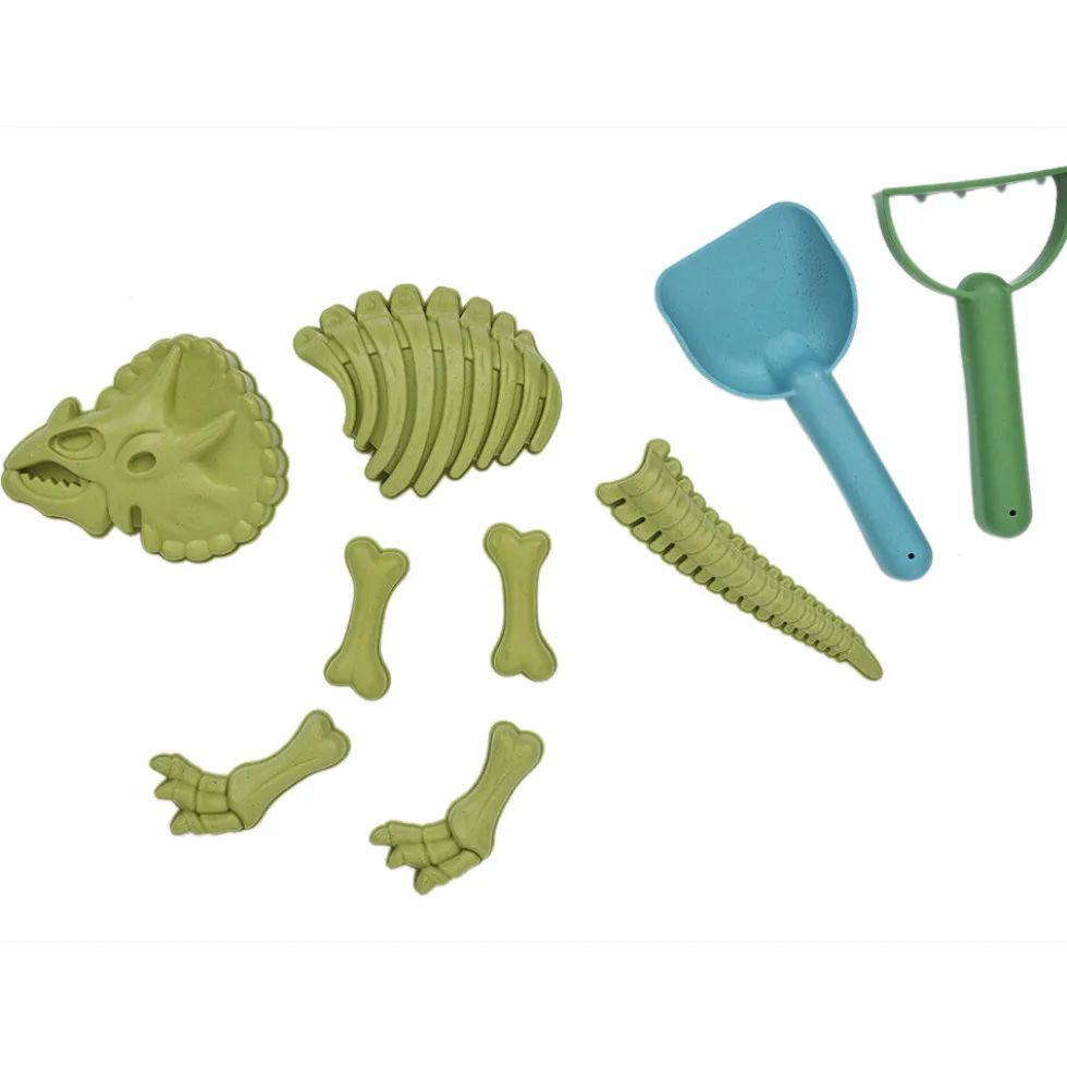 Moule dinosaure vert avec pelle et rateau 9 pièces