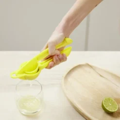 Pince presse citron manuel plastique vert