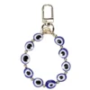 Porte-clé bracelet perle yeux L10cm (2 modèles)