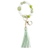 Porte-clé pompon simili et bracelet perle en bois Ø8xL9cm (2 modèles)
