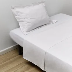 Taie d'oreiller 50x70cm 100% coton finition volant blanc