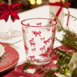 Verre bas transparent motifs noeuds roses Ø8,8xH10cm